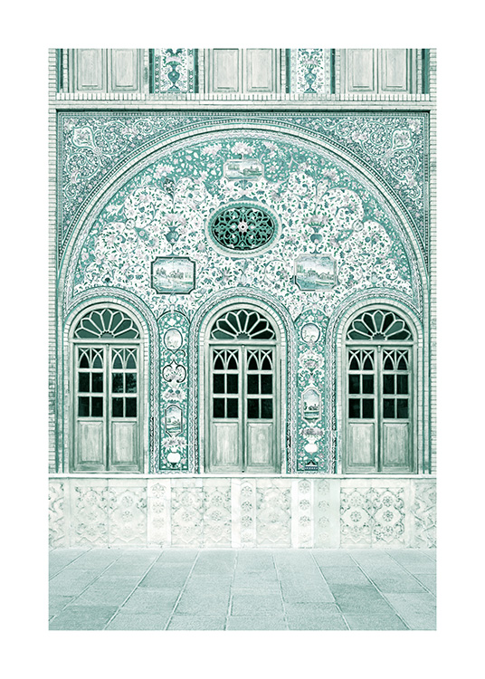 Fotografi af mintgrøn facade med mosaikmønster og mintgrønne døre