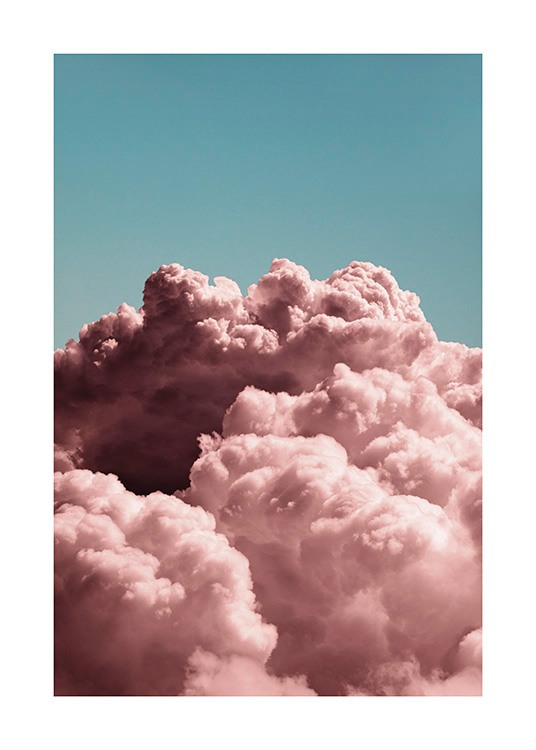  – Fotografi af tykke lyserøde skyer med en klar blå himmel i baggrunden