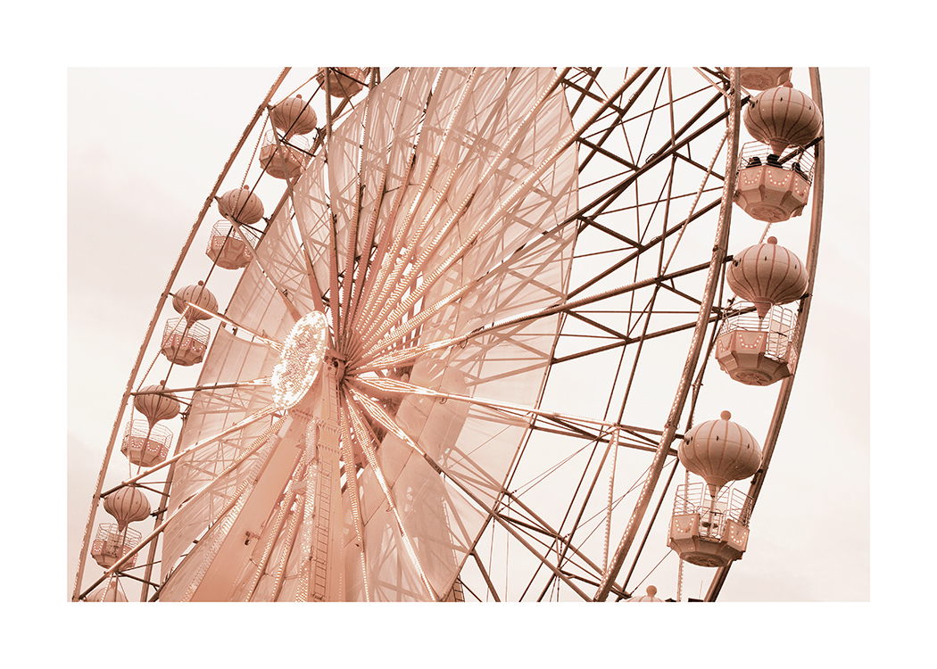  – Fotografi af et pariserhjul i lyserødt med en lys beige himmel i baggrunden