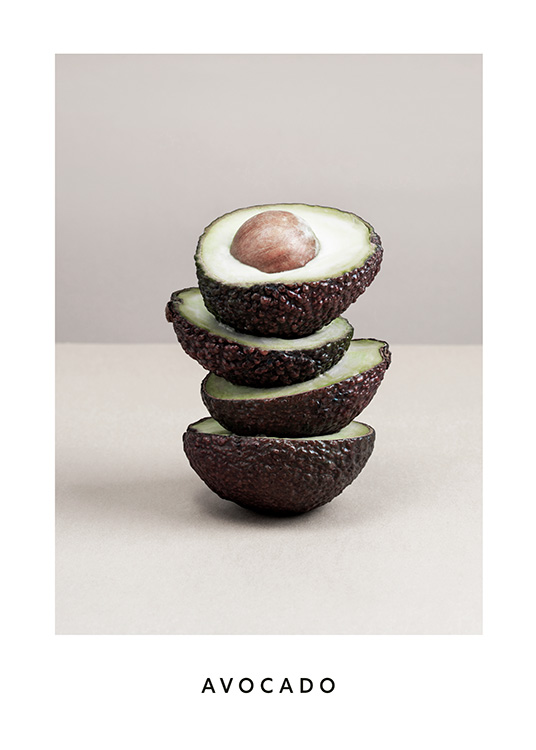  – Fotografi af halve avocadoer, der balancerer oven på hinanden, mod en grå baggrund